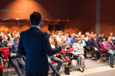 Speaker at Business Conference and Presentation. Audience at the conference hall.