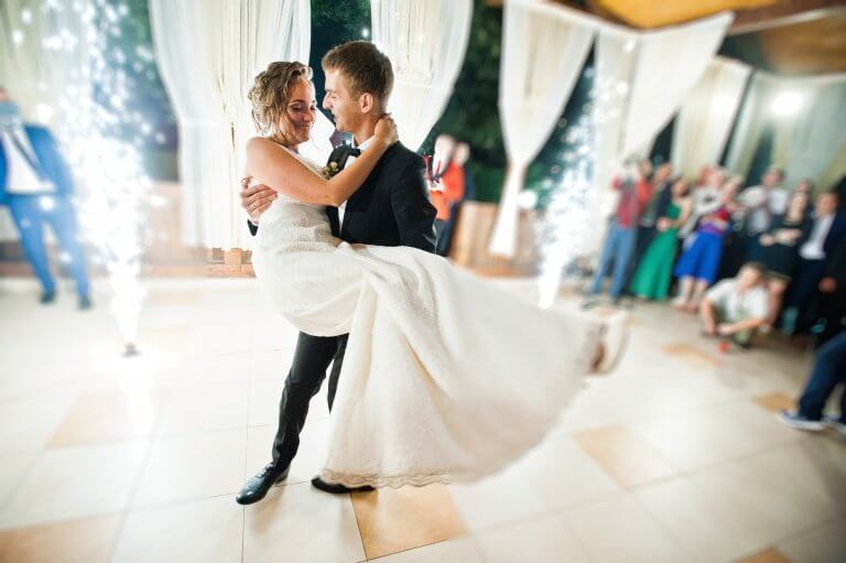 First wedding dance with fireworks of wedding couple.